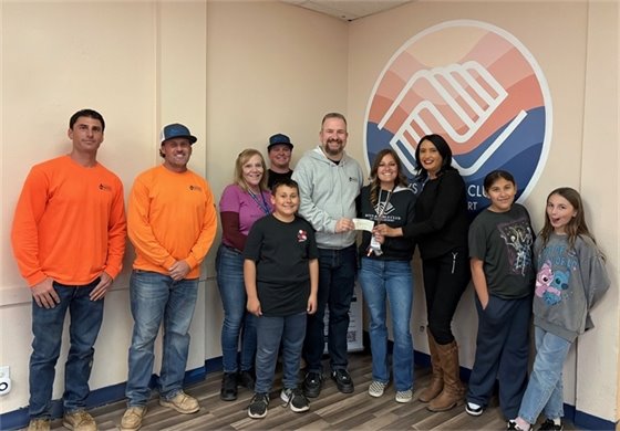 Image of People at check presentation jpg