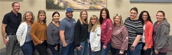 men and women standing in a line