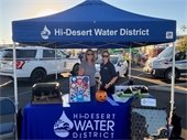 photos of employees at the National Night Out in Yucca Valley at Water Booth